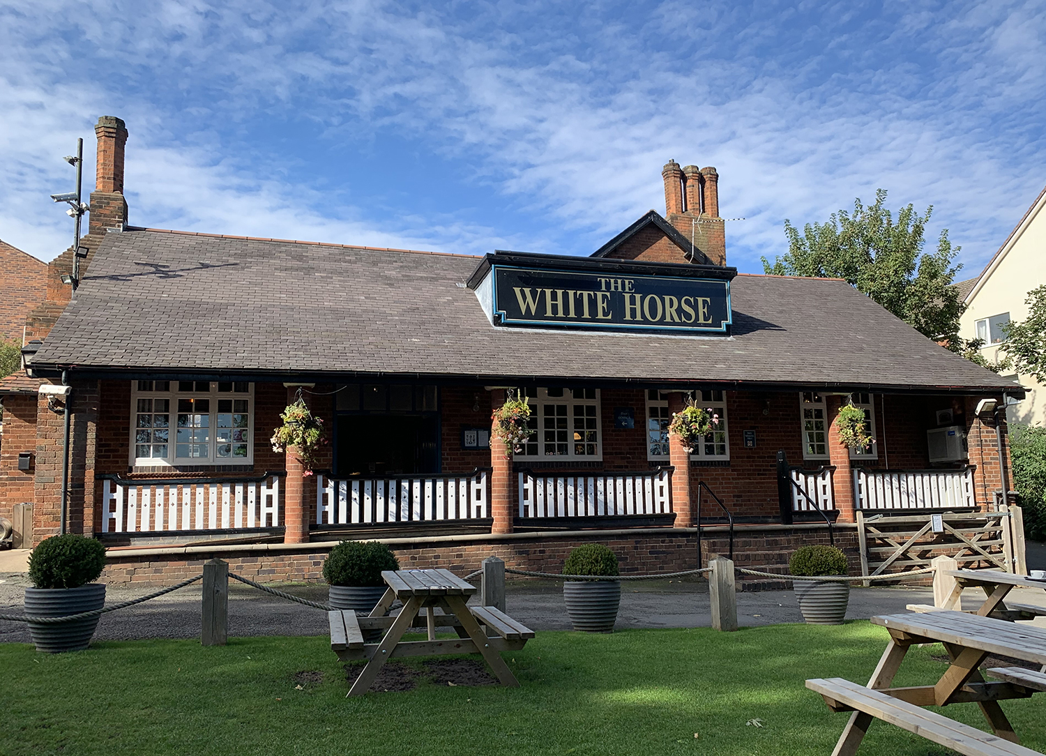 The White Horse logo